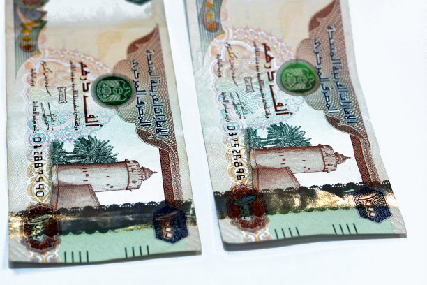 正面1000 1000迪拉姆阿拉伯联合酋长国的纸币，阿联酋的货币与盾形纹章和Al Hosn宫殿的图片图片下载