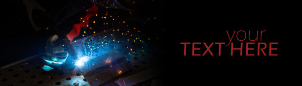 工业焊机带燃烧器，文字空间。黑色背景,旗帜。图片下载