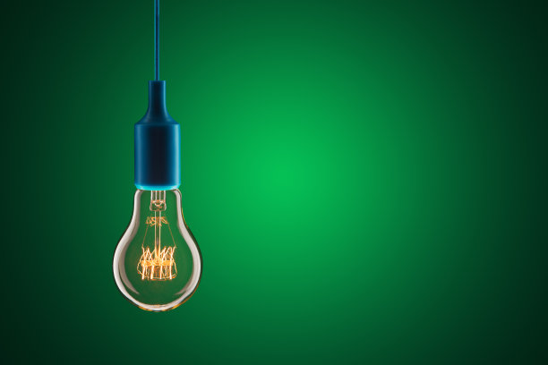 创意和领导理念-绿色背景的灯泡图片下载