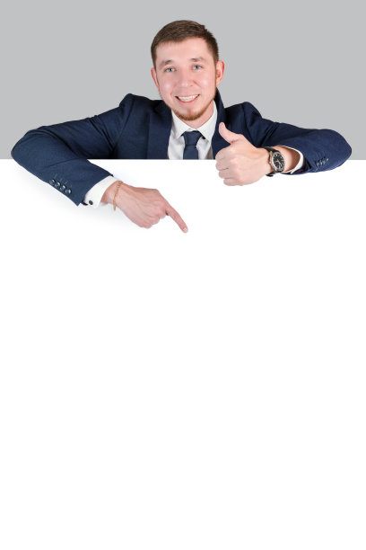 商人用食指指着白板。垂直图图片下载