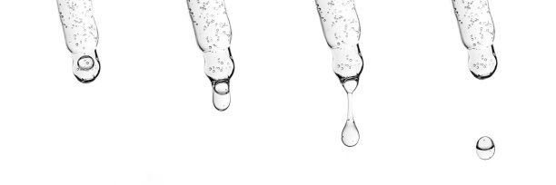 有几个移液器的横幅，上面有血清或其它化妆品。图片下载