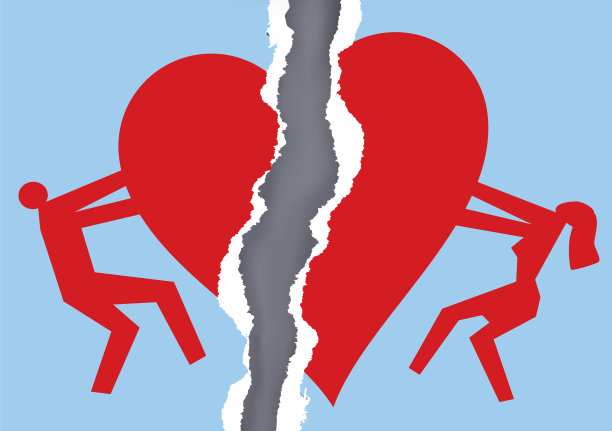 离婚夫妇撕心形纸。图片下载