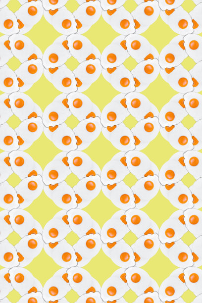 黄色背景上的煎鸡蛋的创意照片图片下载