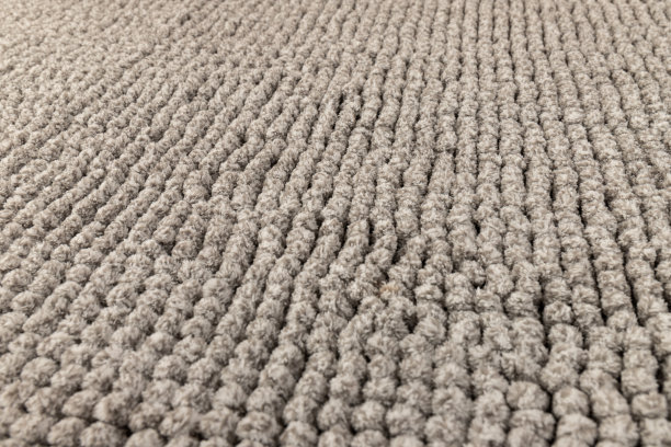 灰色雪尼尔软浴垫纹理背景。浴室配件。前视图。图片下载