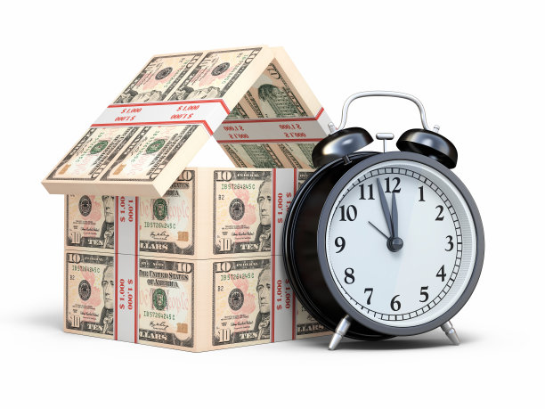 10元钞票和黑色闹钟图片下载