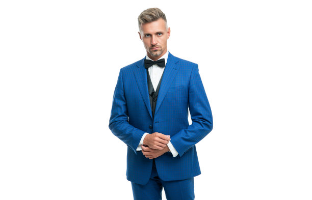 成熟的男人在领结领带蓝色的西装。商人孤立于白色。穿着燕尾服的领导图片下载