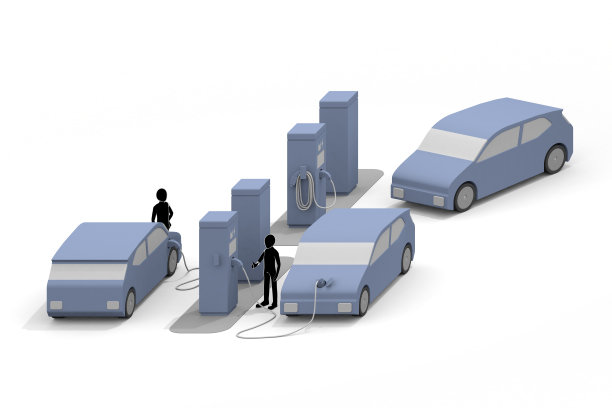 给电动汽车充电。一个充电器安装在路边。从充电架上给电池充电。一辆考虑自然环境的汽车。图片下载