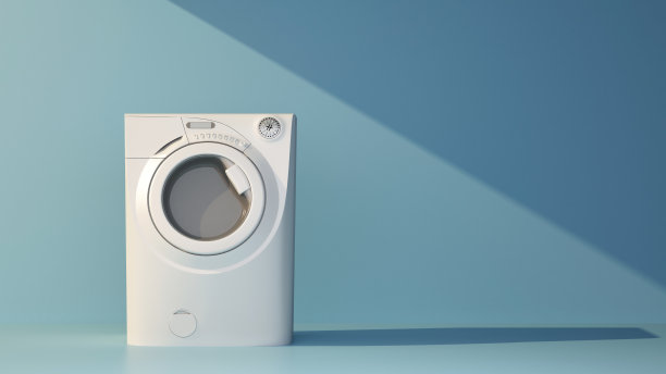 白色洗衣机在蓝色的背景图片下载