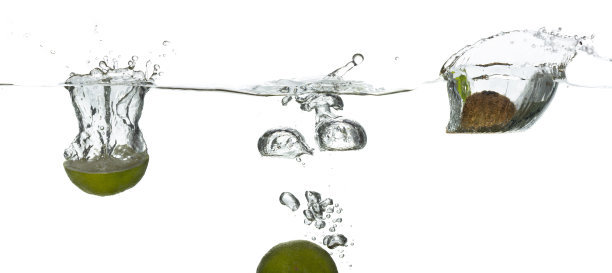 明亮多汁的水果在明亮的背景与壮观的水花高分辨率图片下载