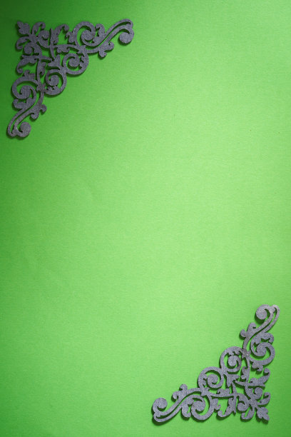 绿色背景上的金色花纹理图案图片下载