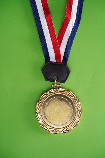 绿色背景上的金牌图片下载