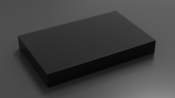 平盒模拟:灰色背景上的黑色礼品盒。侧视图。图片下载