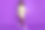 迷人的年轻女士走的照片看相机穿绿色衬衫短裤运动鞋孤立的紫色背景图片下载