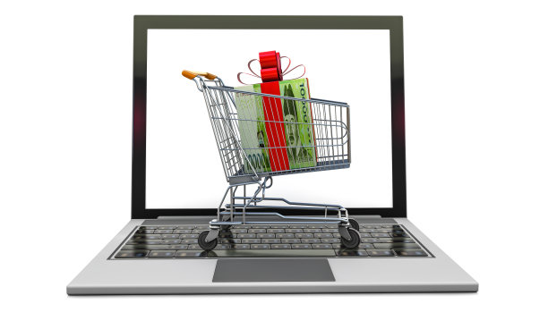 笔记本电脑上购物车里的韩元礼品图片下载