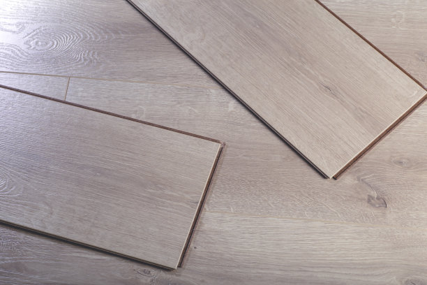 层压板的背景。在室内设计中，地板使用木质层压板和镶木地板。天然木材的纹理和图案。图片下载
