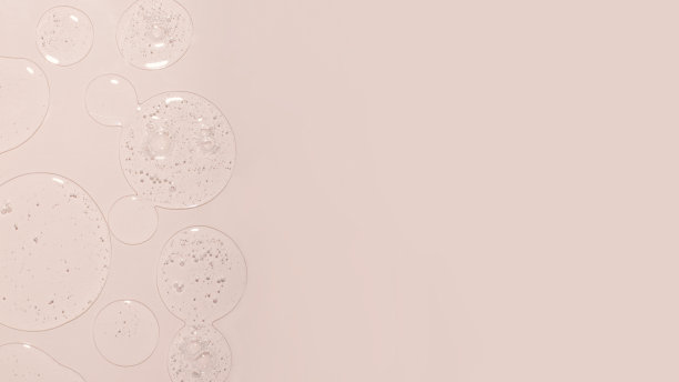 大型粉彩横幅与化妆品凝胶滴在表面。图片下载