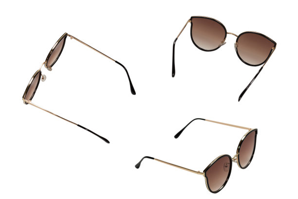 女人棕色时尚太阳镜孤立在一个白色的背景。图片下载