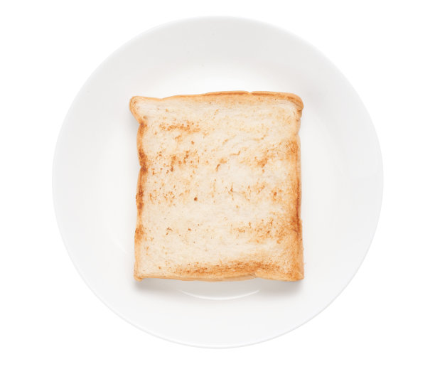 切片吐司面包在盘子上的白色背景图片下载