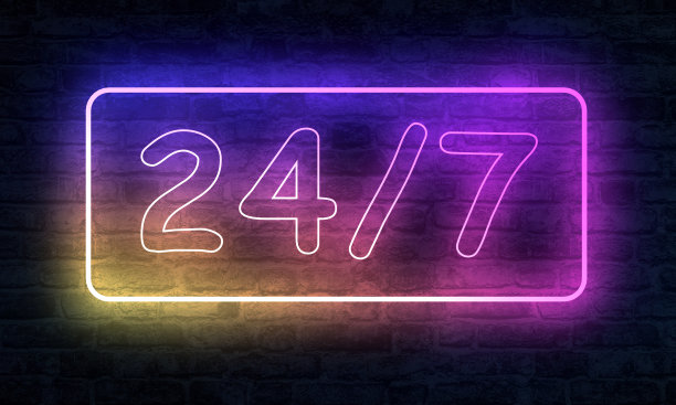 24/7符号霓虹灯在有照明的砖墙上全天候工作的标志图片下载