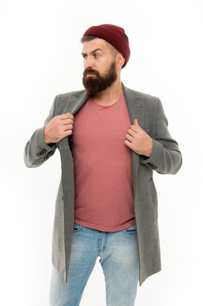 时尚的服装帽子明亮的配件。时尚潮流。秋春季时尚休闲套装。男装和男性时尚概念。留着胡子的男人时髦的外套和帽子图片下载