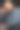 穿毛衣的中年男子看着镜头。相貌正常的未刮胡子男子。图片下载