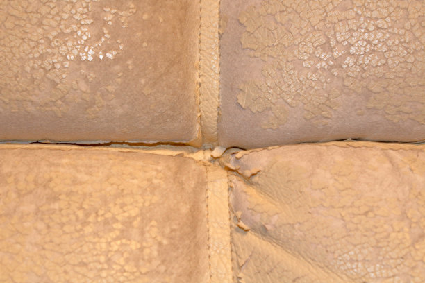 去皮皮革沙发。特写镜头。背景。纹理。图片下载