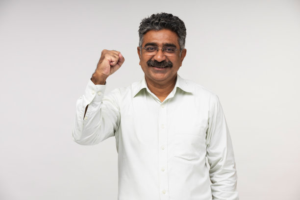 成熟的商人在白色背景股票照片图片下载