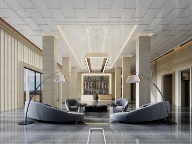 门厅的等候区有一个半圆形的灰色沙发和扶手椅，室内有一盏弧形落地灯，黄色大理石的柱子和高高的天花板。图片下载