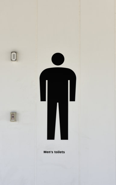 墙上有男厕所的标志图片下载