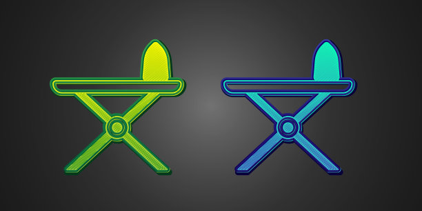 绿色和蓝色的电熨斗和熨衣板图片下载