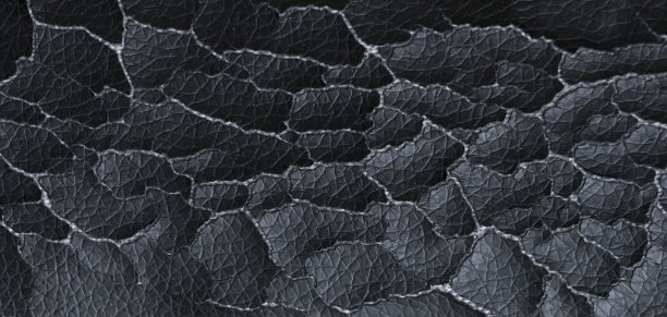 龟裂皮肤的纹理。破旧的椅套图片下载