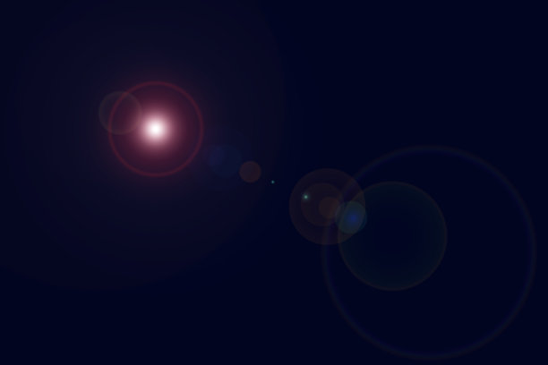 闪光镜头耀斑看起来像多色宇宙球的光和反射光在各种大小中心的深海军蓝背景图片下载