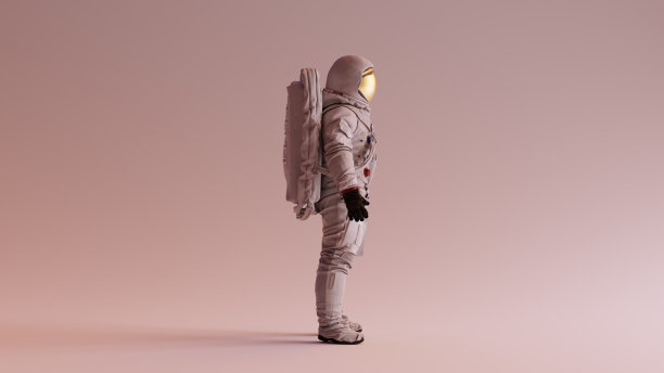 宇航员与金遮阳板和白色太空服与温暖的背景侧照明侧视图图片下载