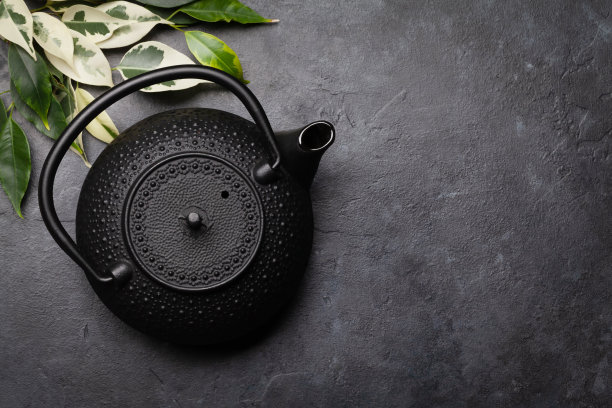 石桌上的茶壶图片下载