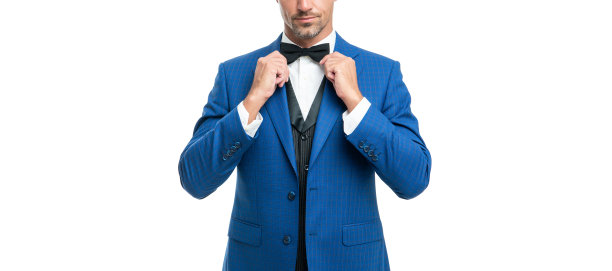 剪裁不正的家伙，穿着蓝色西装，打着领结。商人孤立于白色。穿正装的大老板图片下载