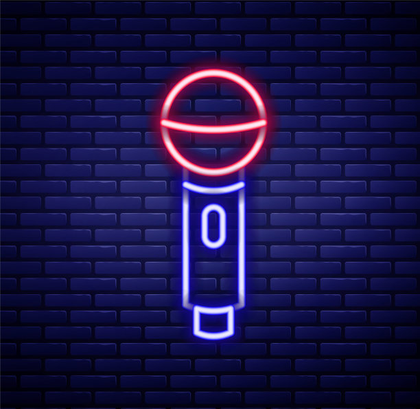 发光的霓虹灯线麦克风图标孤立在砖墙背景。在空中无线电麦克风麦克风。演讲者的迹象。色彩斑斓的轮廓的概念。向量图片下载