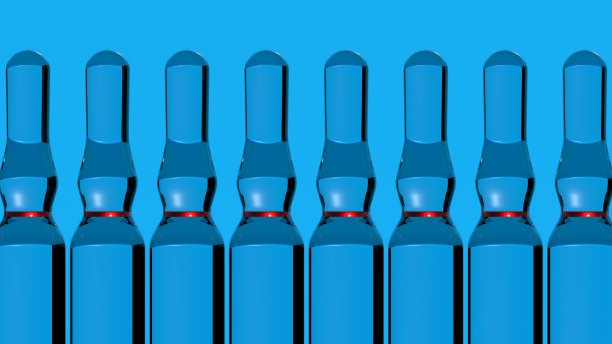 3 d渲染。装有药物的玻璃安瓿在蓝色的背景上排成一排图片下载