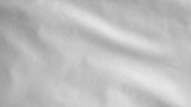 空的白旗在风中飘扬。近距离的象征投降吹丝。图片下载