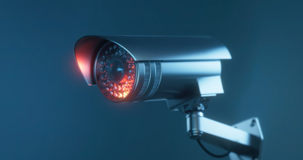 摄像头从侧面在蓝色背景和复制空间图片下载