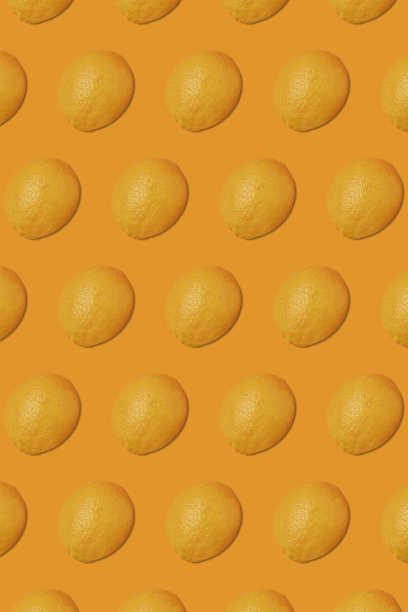 橙色背景下的橙子水果的创意照片图片下载