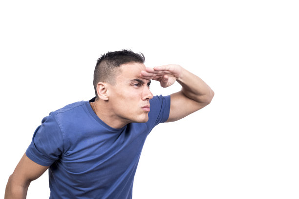 保护眼睛不受光线照射的人在找东西图片下载