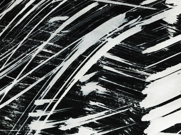 用刷子在黑色背景上画出白色的图案图片下载