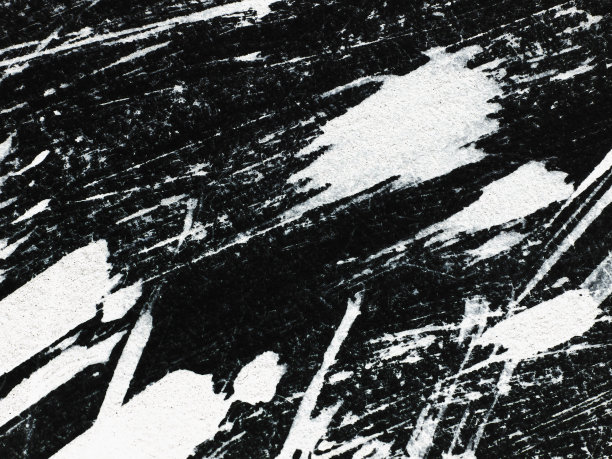 用刷子在黑色背景上画出白色的图案图片下载