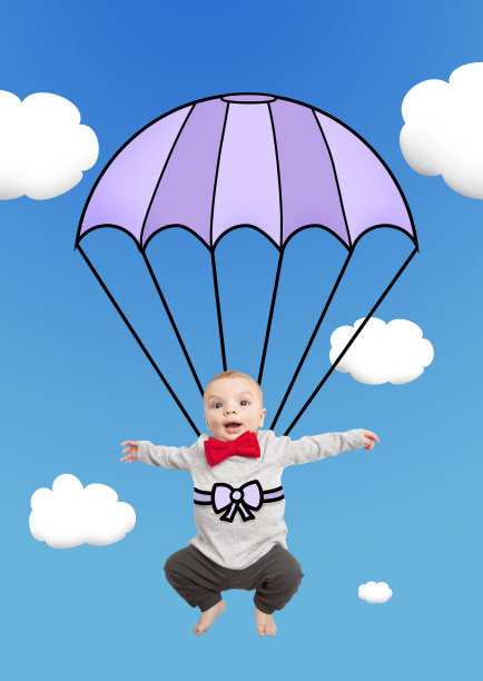用降落伞合成材料在空中的男孩图片下载