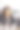 加勒比卷发年轻女子在沙发上用笔记本电脑工作图片下载