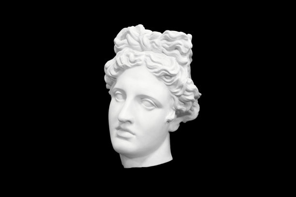 一个女人的半身像，石膏浇铸在黑色的背景上。四分之三的位置图片下载