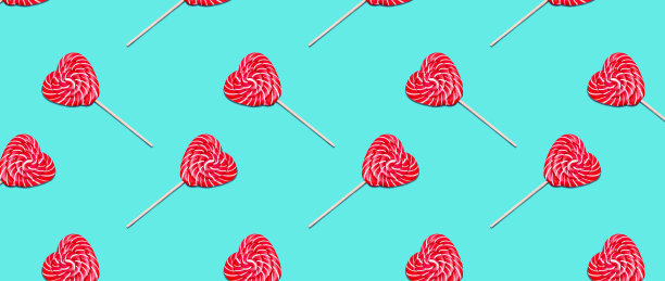 棒棒糖糖果的形状在一个蓝色的背景上无缝的图案。情人节的概念图片下载