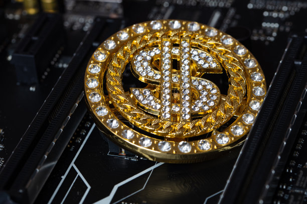 黄金美元符号与宝石在主板背景图片下载