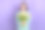 照片正面快乐漂亮的女士抱着郁金香花微笑礼物孤立在紫色的颜色背景图片下载