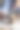 一个数钞票的女人往一罐欧元硬币里放了50美分。图片下载